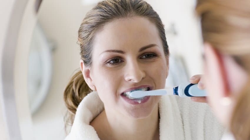 Image result for woman tuse toothbrush